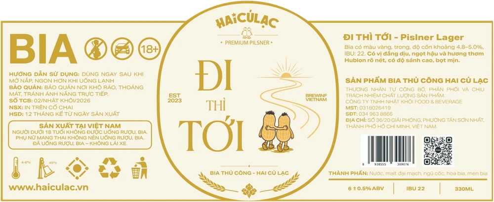 Đi Thì Tới bottle label laid flat: cream and gold background, two peanuts with their backs turned, walking toward the road and the sun